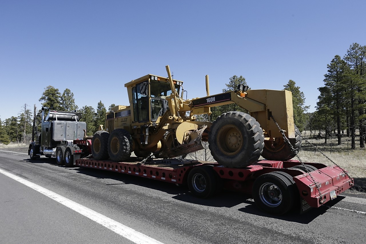 truck hauling tractor