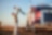 man happily playing with son near red truck