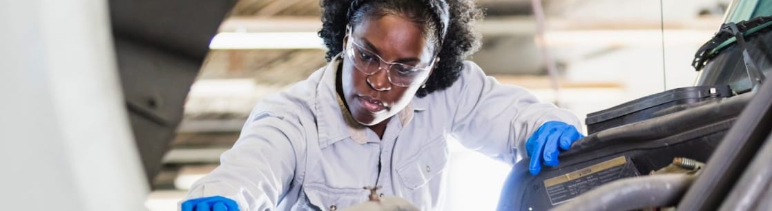 women-working-on-truck-engine-1