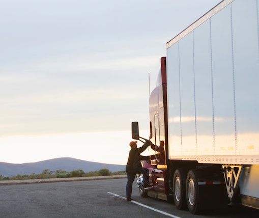 man-climbing-in-truck-cabin-1