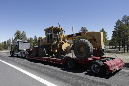 truck hauling tractor