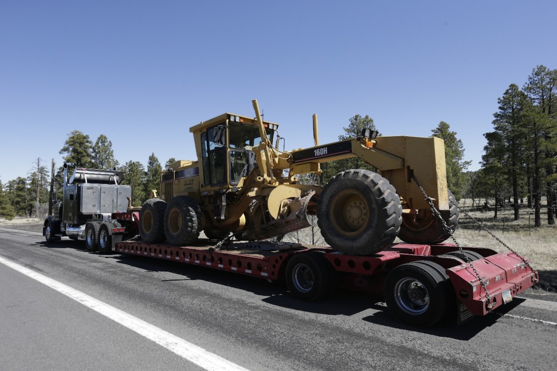 truck hauling tractor