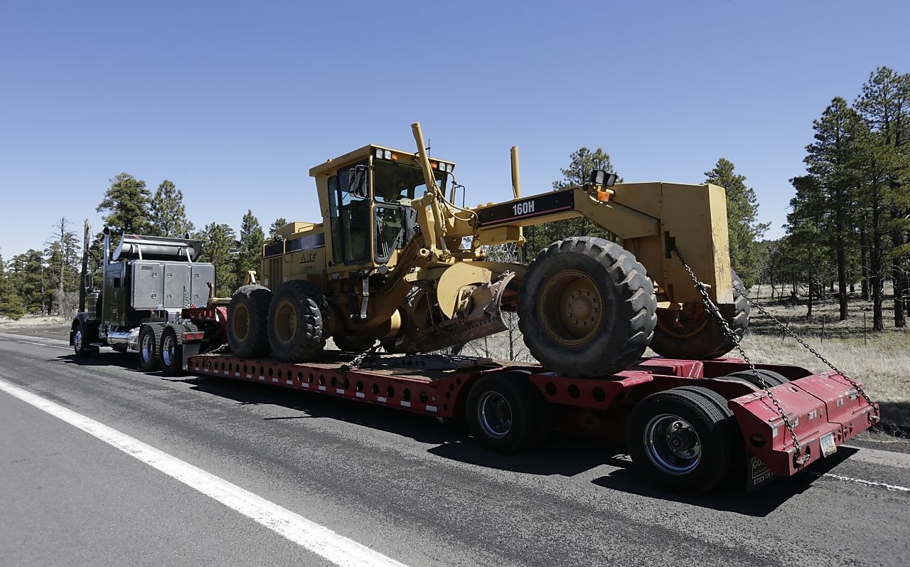 truck hauling tractor