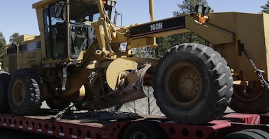 truck hauling tractor