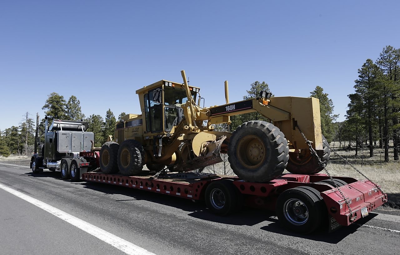 truck hauling tractor