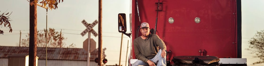 guy-sitting-behind-truck-1